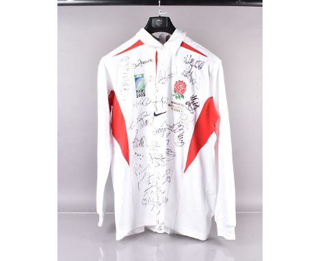 England 2003 Rugby World Cup Winners signed shirt, all squad plus coach Sir Clive Woodward, autographs are Iain Balshaw, Ben 