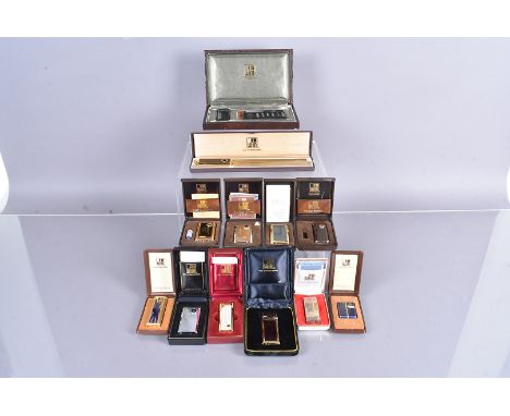 An assortment of Win Interntional pocket lighters and sets, including a lighter and calculator set, a Gasmatch De Luxe, vario