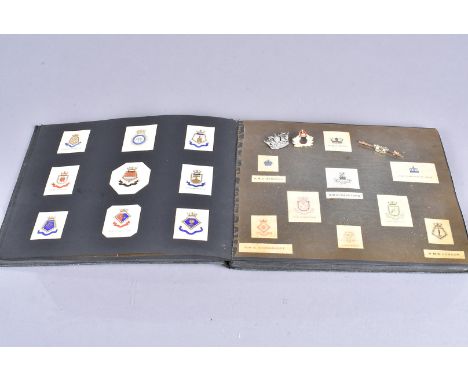 Two 9ct gold and enamel sweetheart brooches, together with a Naval badge, plus a book containing a number of Naval crests, co