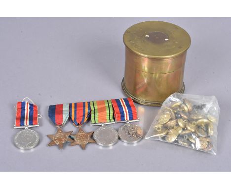 An unattributed WWII medal group, comprising War, Defence, 1939-45 Star and Burma Star, plus another WWII War medal, a select