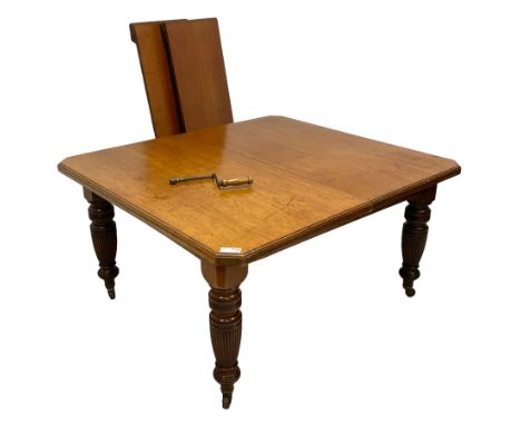 Late Victorian mahogany dining table, rectangular canted and moulded top, telescopic extending action with two additional lea