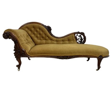 Victorian mahogany framed chaise longue, scrolled back and arm carved and pierced with scrolling vines and grapes with ribbon