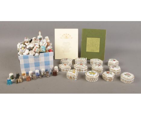 A collection of twelve ceramic trinket boxes from the Empress Josephine's Rose Garden, together with a very large quantity of