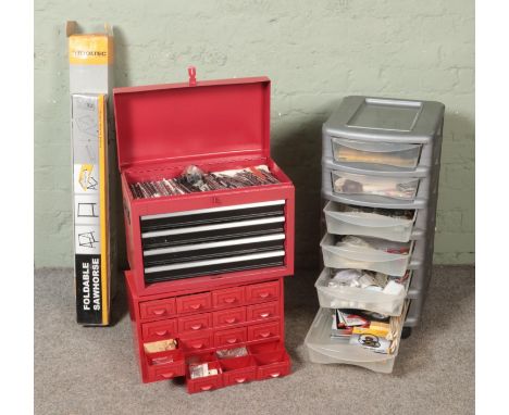 Two metal and one other tool drawers with contents along with a Tooltec folding workbench and folding sawhorse. Contents incl