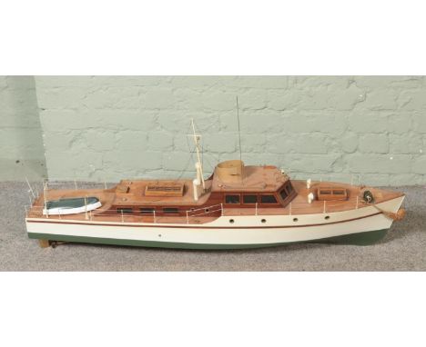 A large remote control pond model of a single funnel steam ship decorated with rowing boat and mast. Approx. boat length 126c