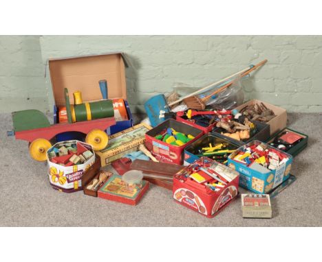 A large collection of vintage toys and games, including Meccano pieces, Lego, Carpet Bowls, tiddly winks, spirograph set, mod