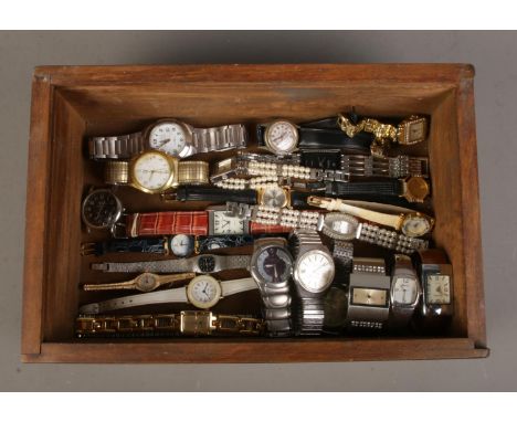 A box of assorted Gents and Ladies wristwatches, to include Roamer 17 Jewel example, along with Accurist, Ravel and Rotary.  