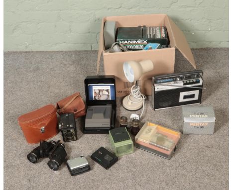 A box of mostly photographic equipment and accessories to include Kodak 277X, Polaroid Image System, Rollei projector, slides