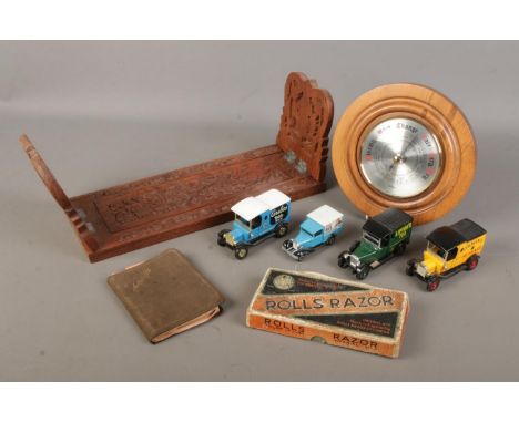 A group of collectables. Includes Eastern book slide, Rolls Razor, barometer, autograph book with military inscriptions and M
