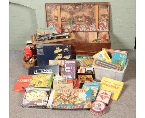 A large collection of vintage games and toys including scrabble, monopoly, dad's army board game, Meccano sets, puzzles, lott