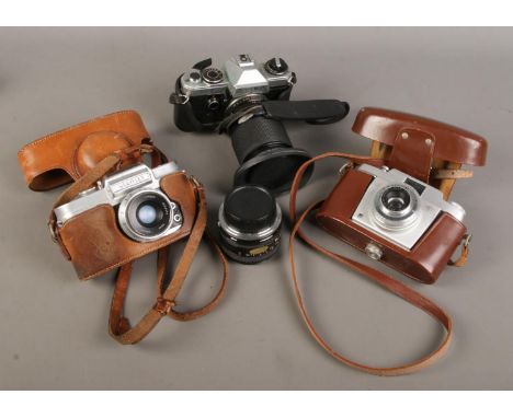 A Wrayflex 35mm SLR camera along with Agfa and Yashica FX-D examples.  Lens clouded on Wrayflex.