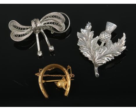 Three decorative vintage brooches to include Robert Allison silver thistle (hallmarked Glasgow 1954), rolled gold fox hunting