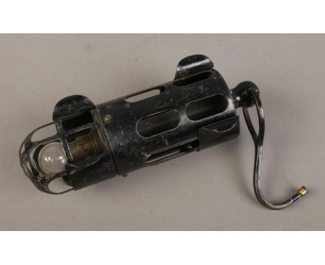 A vintage black painted 'bird cage' inspection lamp by Lucas Ltd.  
