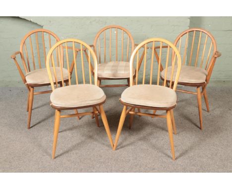 A harlequin set of five dining chairs, to include three Ercol Windsor elbow examples; model 370, for Lucian Ercolani.  