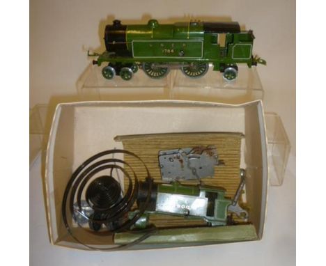 A Hornby 4-4-2 compound tank locomotive, clockwork, in LNER green, marked 1784, G, and a Hornby 0-4-0 tank engine (disassembl