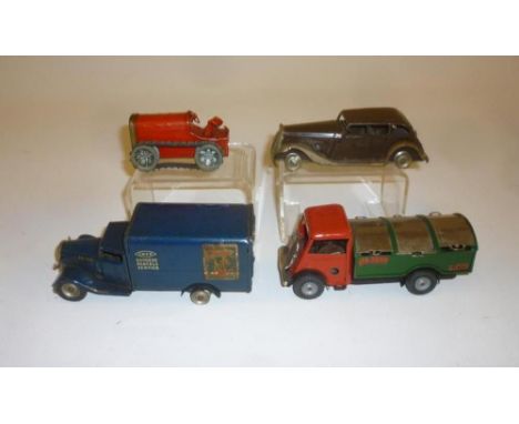 Four Minic clockwork vehicles comprising Dustbin lorry, 5" long, LNER Express Parcels Van (motor AF), 5 1/4" long, pre-war Va