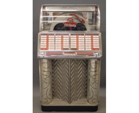 A Wurlitzer Hi-Fidelity Juke Box, c.1955, playing fifty four 45 r.p.m. records, with nickel plated and aluminium faced wooden