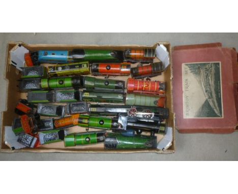 Playworn Brimtoy locomotives including Streamliners and tender engines, a Brimtoy train set with locomotive and three coaches