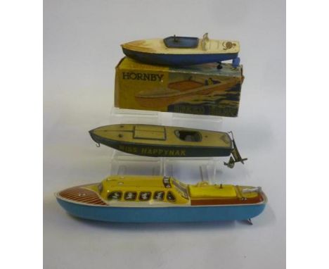 A Hornby "Hawk" speedboat, tinplate, clockwork motor, cream deck, blue hull, 10" long, boxed, and two other tinplate boats, o