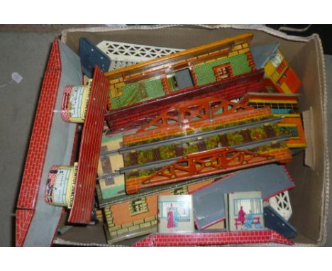 Trackside accessories by Brimtoy, Chad Valley and others including stations, bridges, signal box and foot bridge, some damage