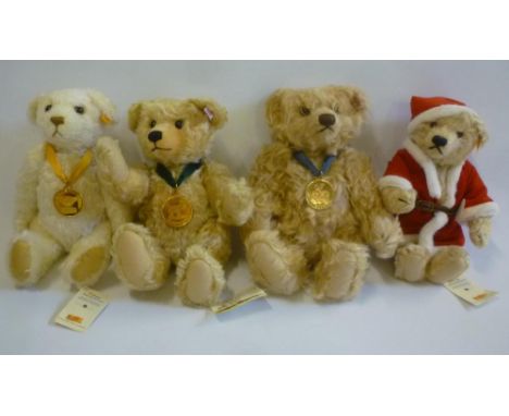 Four Steiff replica bears comprising "Millenium Bear" in cream plush, 11" high, bagged and boxed, "Button in ear Bear" in bei