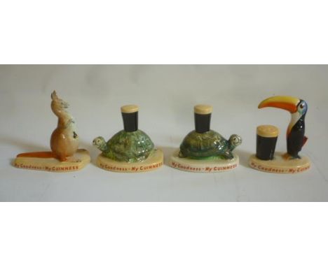 Four Guinness Carltonware pottery miniatures comprising Toucan with Pint, 3 1/2" high, Kangaroo 3 3/4" high, and two Tortoise