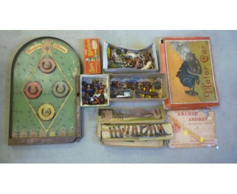 A quantity of Britains and other lead farm animals, equipment and soldiers, two sets of semi-flat tin plate Cameron Highlande