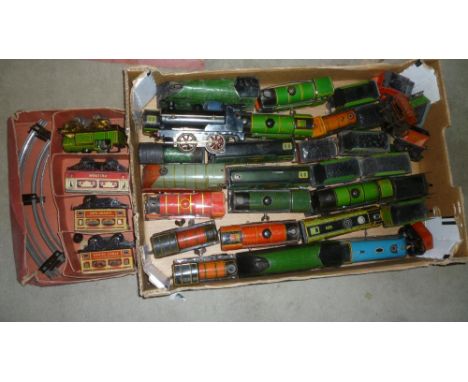 Playworn Brimtoy rolling stock comprising forty one goods and passenger coaches, some items damaged and some rusting to paint