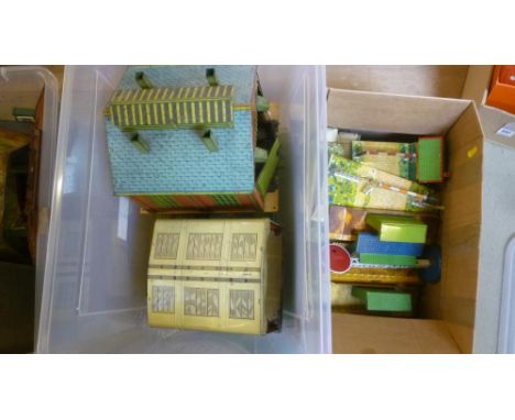 Trackside accessories by Hornby and Brimtoy including engine shed, station buildings, level crossing, and a small quantity of