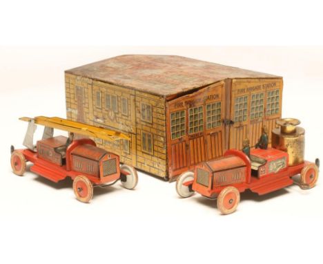 A Tipp & Co Fire Station Set, pre-war, with two doors inscribed "Fire Brigade Station", 9 1/2" x 9", with two clockwork fire 