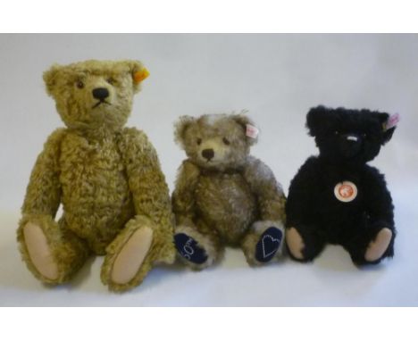 A Steiff "Classic 1910" black teddy, 10" high, with box and certificate, and two further brown Steiff bears with ear labels, 