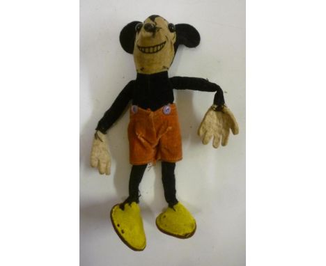 A Dean's velveteen Mickey Mouse, pre-war, with button eyes, printed features and felt hands and shoes, 5 1/2" high