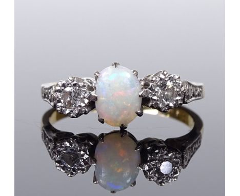 An 18ct gold 3-stone opal and diamond ring, setting height 7.2mm, size M, 3.1g 