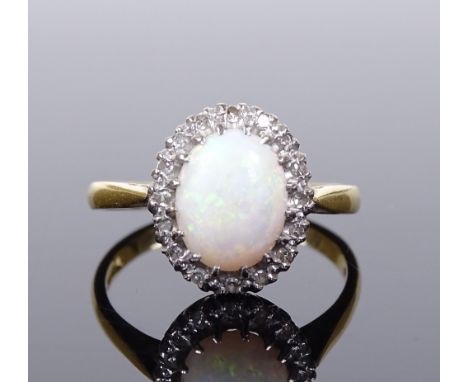 A Victorian 18ct gold opal and diamond cluster ring, setting height 12.3mm, size L, 3.3g 