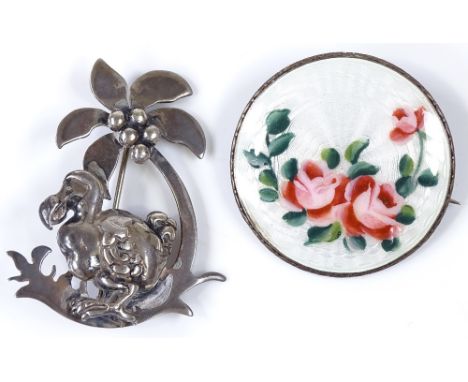 A modern silver dodo brooch, together with a circular silver and enamel floral brooch (2) 
