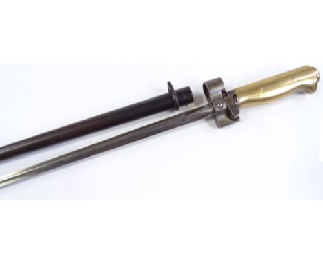 A Continental brass-hilted spike bayonet, with metal scabbard 