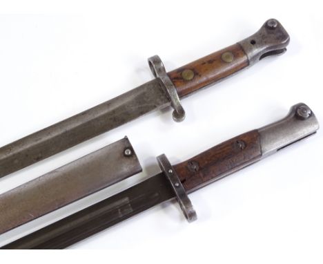 A Victorian bayonet, overall length 42cm, no scabbard, and a First War Period bayonet with metal scabbard (2) 