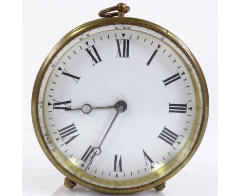 A brass drum-cased clock, circa 1900, with enamel dial, 8-day spring-driven movement, diameter 9.5cm 