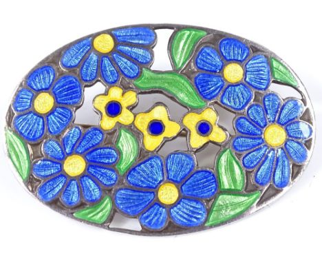 An Arts and Crafts silver and coloured enamel oval brooch, with floral decoration, maker's marks D and S, length 45.8mm, 10.6