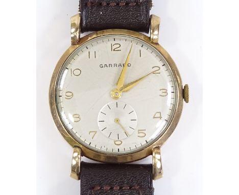A 9ct gold Garrard wristwatch, Mechanical 17 jewel movement with subsidiary seconds dial and Arabic numerals, case width 33mm
