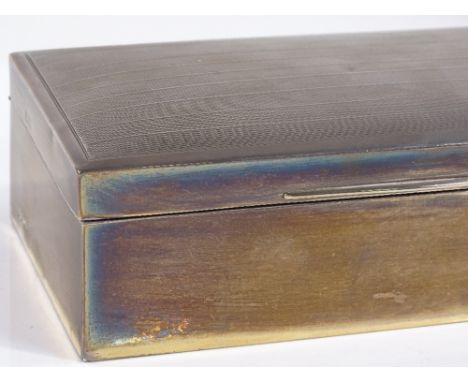 A rectangular silver cigarette box, with engine turned lid, by William Hutton &amp; Sons Ltd, hallmarks Birmingham 1931, leng