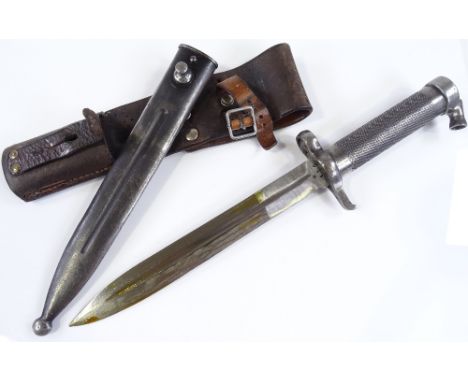 A bayonet knife in original leather and metal scabbard 