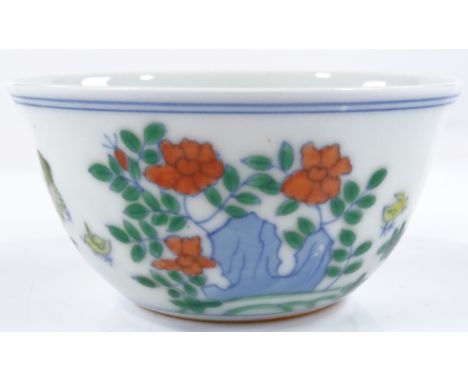 A Chinese doucai enamel chicken cup, with 6 character mark, height 4cm, diameter 8cm 