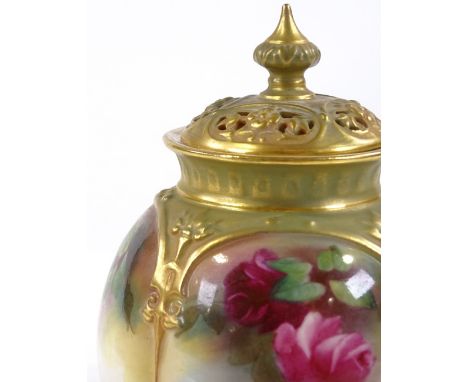 A Royal Worcester floral painted porcelain pot pourri jar and cover, height 11cm 