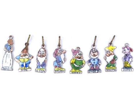 A set of Vintage brass and enamel Snow White and The Seven Dwarfs charms, charm height 21.3mm (2 A/F) 
