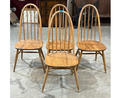 A set of four 1960s stick back chairs. Probably Ercol.