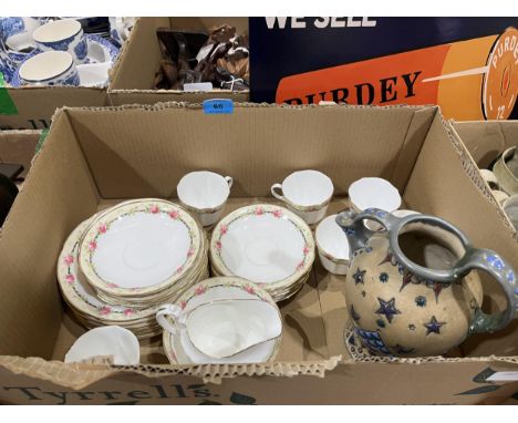 An Aynsley part tea service and an Amphora pottery ewer (repaired).