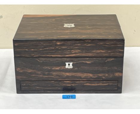 A Victorian coromandel dressing case, bearing a manufacturer's label for H Robin &amp; Son, the interior with a compliment of