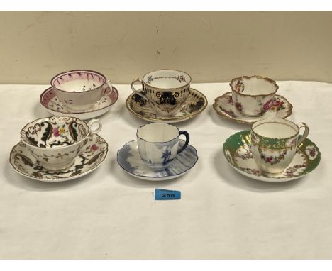 Six cabinet cups and saucers.