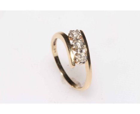 9k three stone diamond ring, size P.